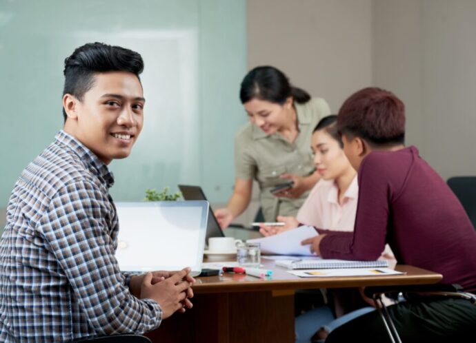 young-asian-man-sitting-meeting-table-work (2)